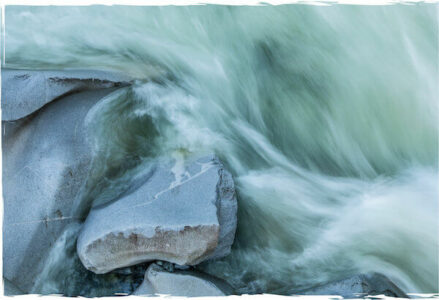 photos of water running on rocks